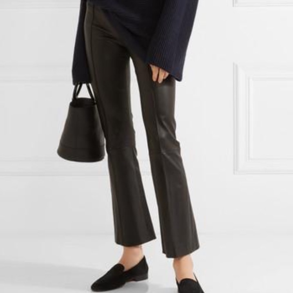 The Row black stretch leather side zip ankle flare